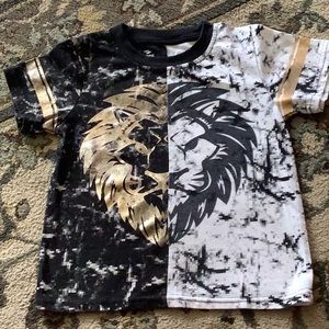 S10PE shirt Black white with a lion face on the front 56 on the size coo…